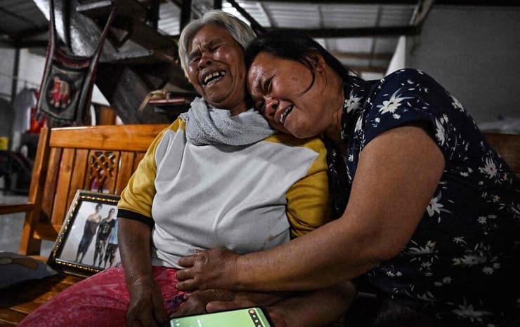 וויוויאו, אמא של שורד השבי סריאון וואטצ'ארא (צילום: Lillian SUWANRUMPHA / AFP) אמא של סריאון וואטצ'ארא