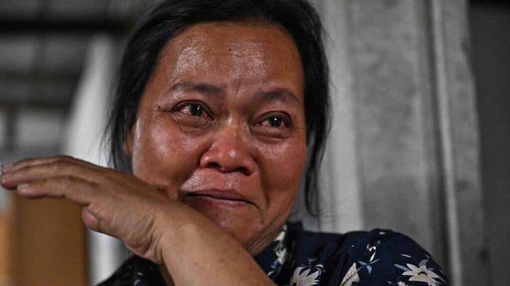 צילום: Lillian SUWANRUMPHA / AFP אמא של סריאון וואטצ'ארא