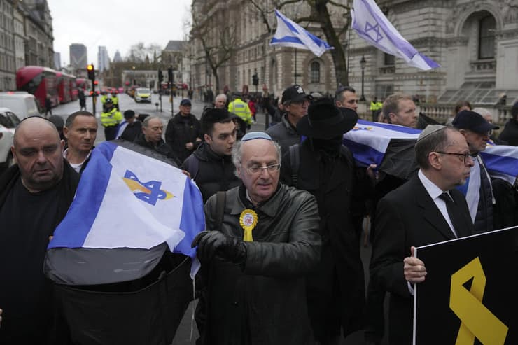 צילום: AP Photo/Kin Cheung לונדון בריטניה