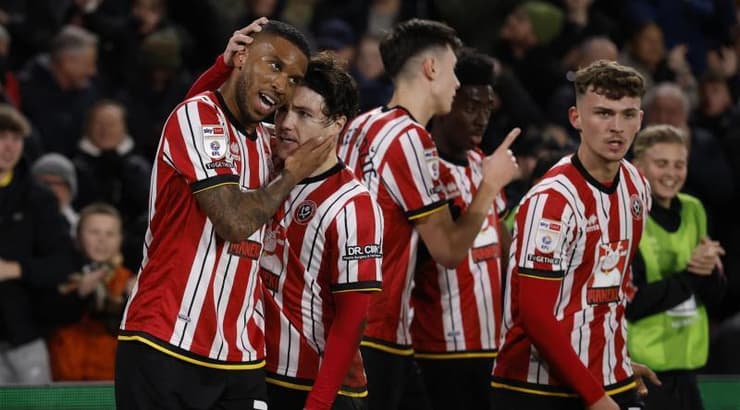 שחקני שפילד יונייטד חוגגים