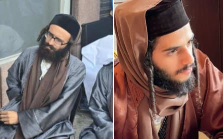 ניסן יהושע יהודה מלכה (מימין) ויואל גולדמן