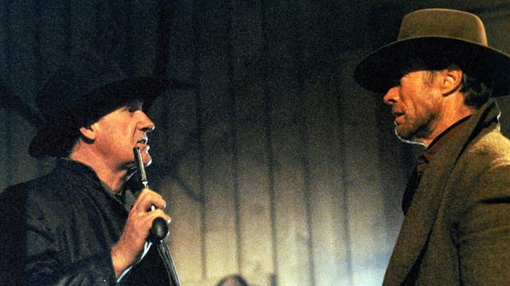 הקמן לצד קלינט איסטווד, מתוך "בלתי נסלח"