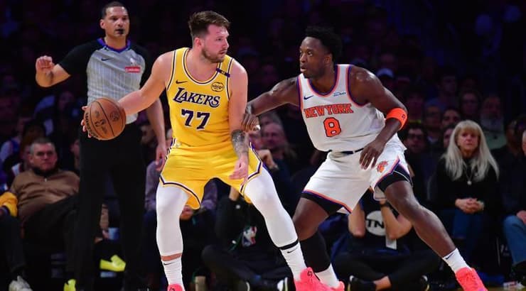 לוקה דונצ'יץ' מול או ג'י אנונובי (רויטרס) לוקה דונצ'יץ' מול או ג'י אנונובי