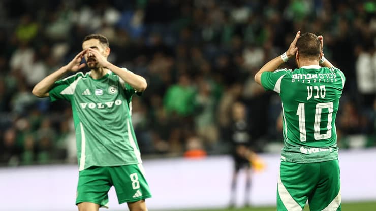 חזיזה וסבע מאוכזבים בסיום (צילום: גיל נחושתן) שחקן מכבי חיפה דולב חזיזה עם דיא סבע