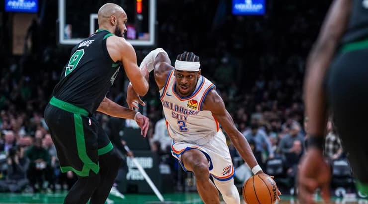 שיי גילג'ס אלכסנדר בדרך לסל (רויטרס) שיי גילג'ס אלכסנדר בדרך לסל