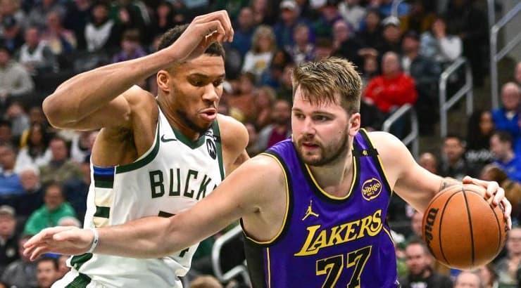 לוקה דונצ'יץ' מול יאניס אנטטוקומפו (רויטרס) לוקה דונצ'יץ' מול יאניס אנטטוקומפו