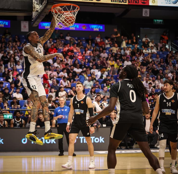 מייקל קייזר מטביע (צילום: עוז מועלם) מייקל קייזר אולסטאר ישראלי