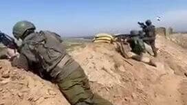 חיילי צה"ל יורים לכיוון רצועת עזה בזמן קריאת השם ״המן״ במגילה