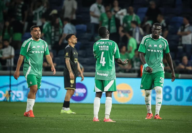 "כואב לי על המצב שם". שחקני מכבי חיפה (צילום: עוז מועלם) שחקני מכבי חיפה מאוכזבים