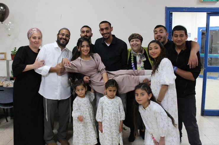 סרן (במיל') אלעד גורי ומשפחתו