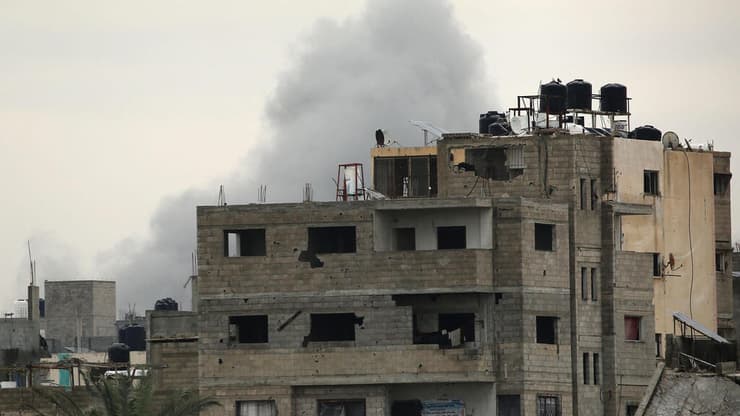 תקיפה במחנה הפליטים אל-בורייג' (צילום: Eyad BABA / AFP) תקיפה במחנה הפליטים אל-בורייג'