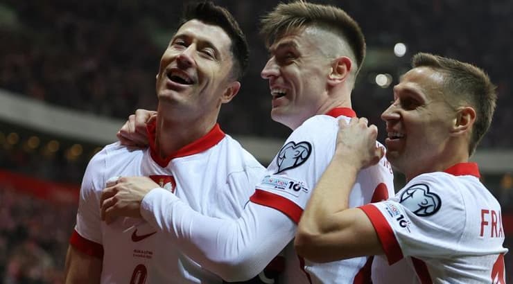 שחקני פולין מאושרים (רויטרס) שחקני פולין מאושרים