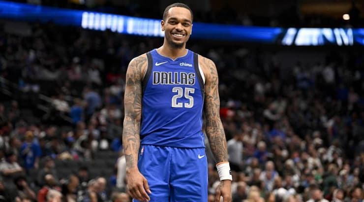 פי ג'יי וושינגטון שמח (רויטרס) פי ג'יי וושינגטון שמח