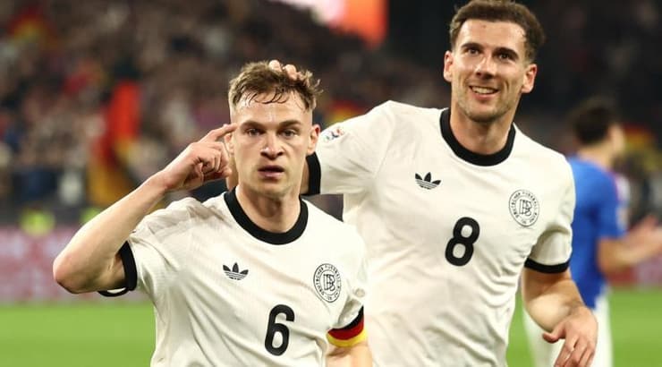 לאון גורצקה ויוזוע קימיך חוגגים (רויטרס) לאון גורצקה ויוזוע קימיך חוגגים