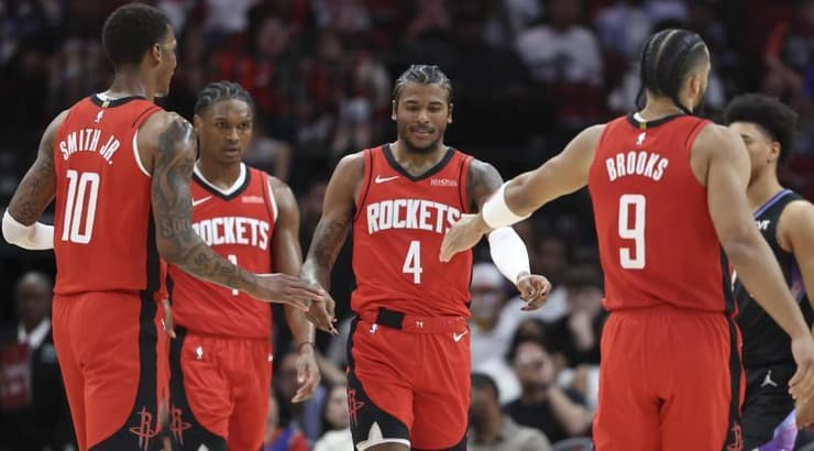 שחקני יוסטון חוגגים (רויטרס) שחקני יוסטון חוגגים