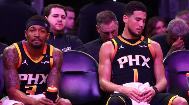 דווין בוקר ובראדלי ביל. הפנים אומרות הכל (רויטרס) דווין בוקר ובראדלי ביל. הפנים אומרות הכל