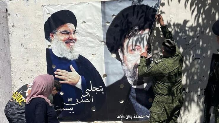 הסרת תמונות של נסראללה וסאל אל-ערורי מרחובות ביירות