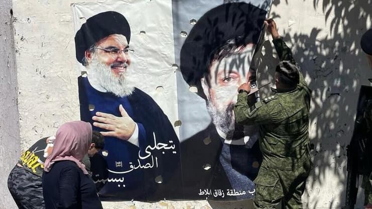 הסרת תמונות של נסראללה וסאל אל-ערורי מרחובות ביירות