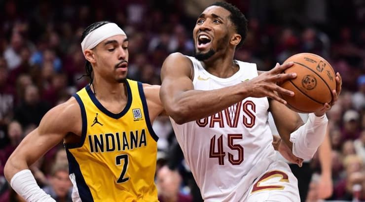 דונובן מיצ'ל מתקשה מול אנדרו נמבארד