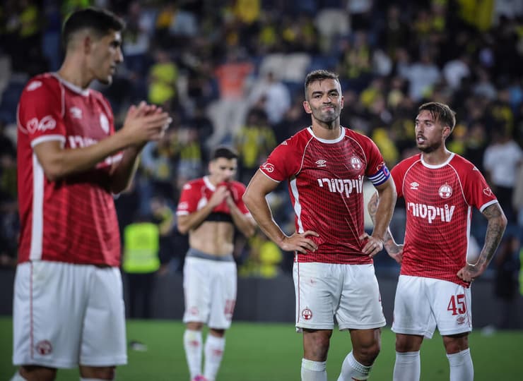 שחקני הפועל באר-שבע מתוסכלים (צילום: עוז מועלם) שחקן הפועל באר-שבע מיגל ויטור, יורי מדיירוש