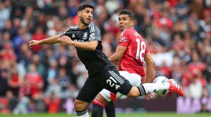 מרקו אסנסיו וקאסמירו (רויטרס) מרקו אסנסיו וקאסמירו