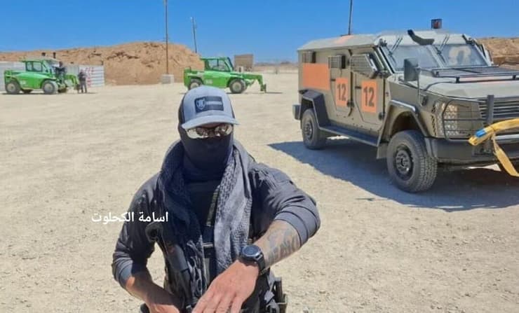 אנשי הצוות האמריקאים בנקודת חלוקת הסיוע בציר נצרים