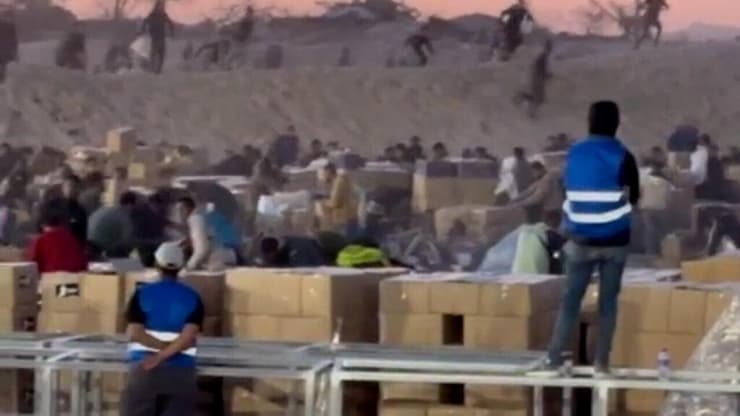 חלוקת סיוע הומניטרי על ידי GHF