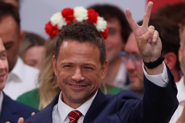 מפסיד, עם חיוך. ראש העיר ורשה רפאל צ'אסקובסקי (צילום: REUTERS/Kacper Pempel ) רפאל צ'אסקובסקי