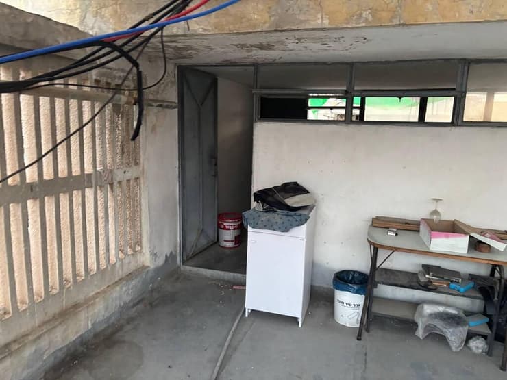 גג הבניין בבת ים בו התבצר הבעל לאחר שרצח את אשתו