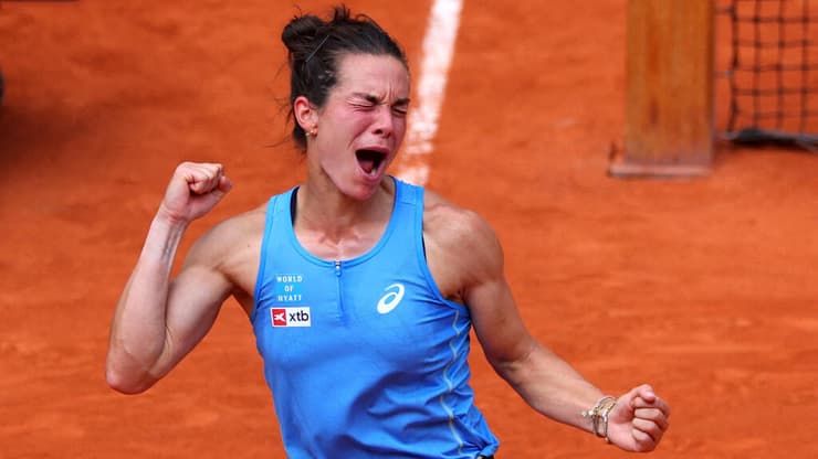 בואסון חוגגת בסיום (צילום: REUTERS/Denis Balibouse) לואיס בואיסון