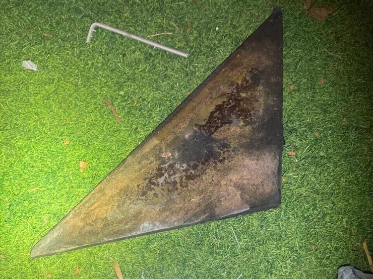 צילום: דוברות המשטרה זירת נפילה של רסיס פריט אמל"ח באזור השפלה