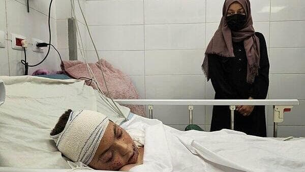 היחיד שנשאר. אדם א-נאג'ר, אחרי הפציעה (Photo by Hani Alshaer/Anadolu via Getty Images) אדם א-נאג'ר