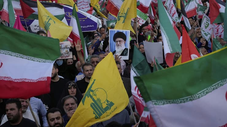 אירועי תמיכה במשטר באיראן (צילום: AP Photo/Vahid Salemi) חגיגות תמיכה במשטר באיראן