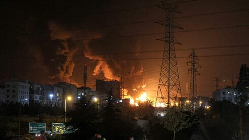 צילום: ATTA KENARE / AFP