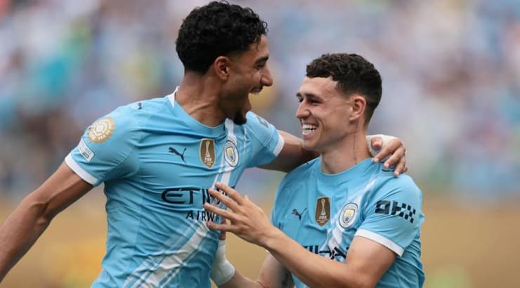 פיל פודן ועומר מראמוש חוגגים (רויטרס) פיל פודן ועומר מראמוש חוגגים