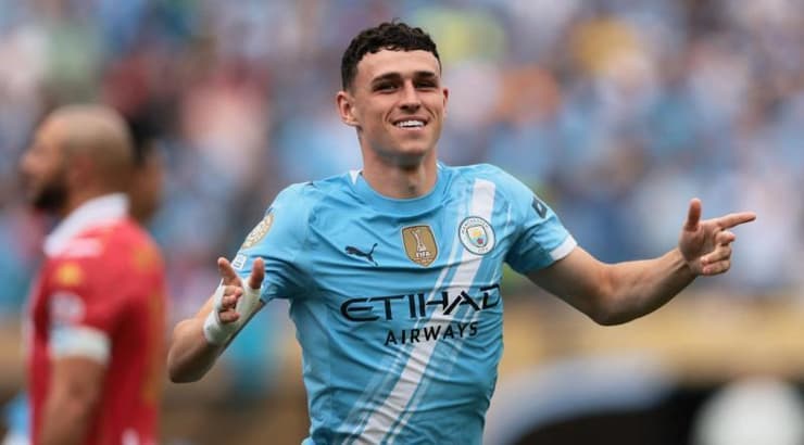 פיל פודן חוגג (רויטרס) פיל פודן חוגג