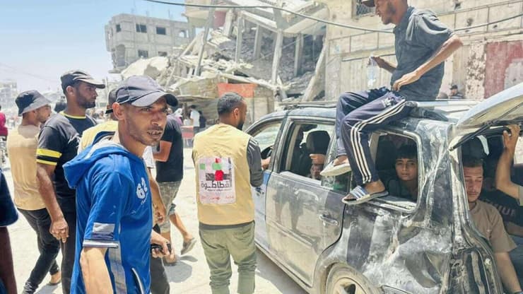 חמולת קטאטוה מאבטחת את חלוקת הסיוע בחאן יונס