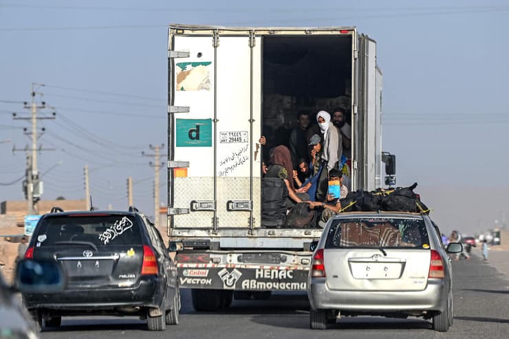 אפגנים שגורשו מ איראן ל אפגניסטן במעבר הגבול איסלאם קאלא 27 ביוני