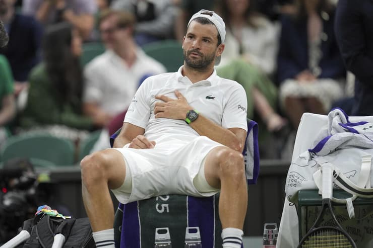 מגדיר את הביטוי "חוסר מזל". גריגור דימיטרוב (AP Photo/Kin Cheung) הטניסאי הבולגרי גריגור דימיטרוב