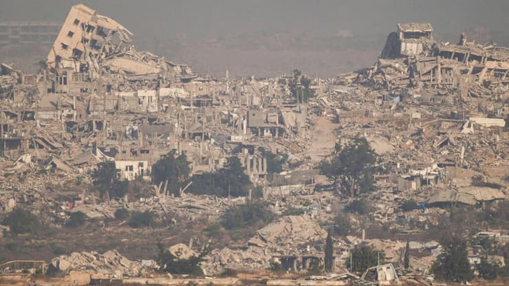 "הפעולות עולות בקנה אחד עם הדין הבינלאומי". ההרס הנרחב ברצועה (צילום: AP Photo/Leo Correa) הריסות בעזה