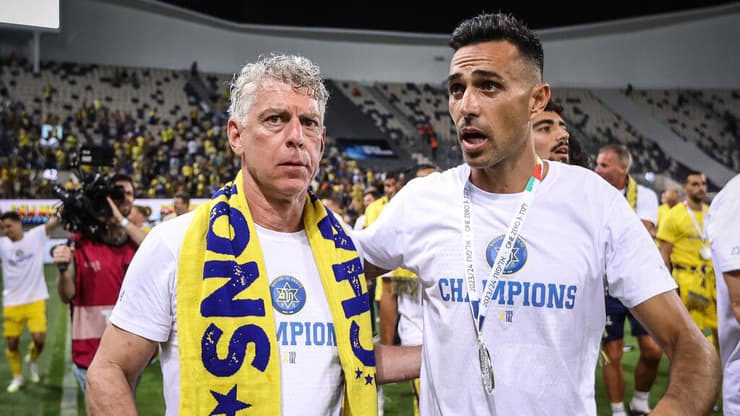 הבין שאין לו ברירה. גולדהאר וזהבי (צילום: עוז מועלם) ערן זהבי ומיץ' גולדהאר