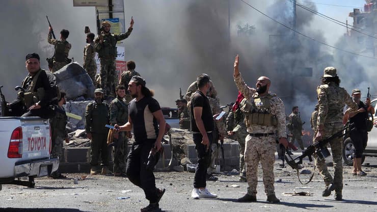 כוחות המשטר השבוע בא-סווידא. הפסקת האש בתוקף (צילום: Sam HARIRI / AFP) כוחות המשטר הסורי נכנסים למחוז א-סווידא ב סוריה