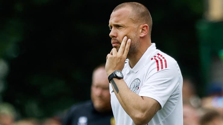 חזר הביתה. הייטינחה (צילום: Vincent Jannink / ANP / AFP) ג'ון הייטינגה