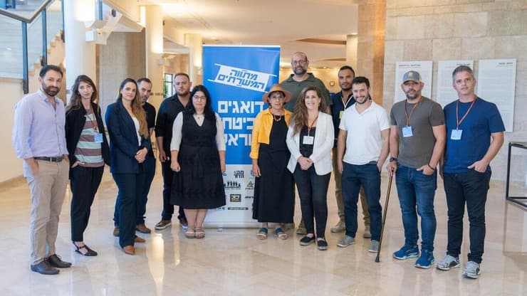 נציגי המילואימניקים בכנס הצגת מתווה המשרתים לחוק הגיוס