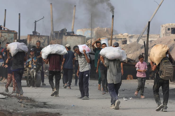 הכנסת סיוע הומניטרי לרצועת עזה (צילום: REUTERS/Dawoud Abu Alkas ) הכנסת סיוע הומניטרי לרצועת עזה