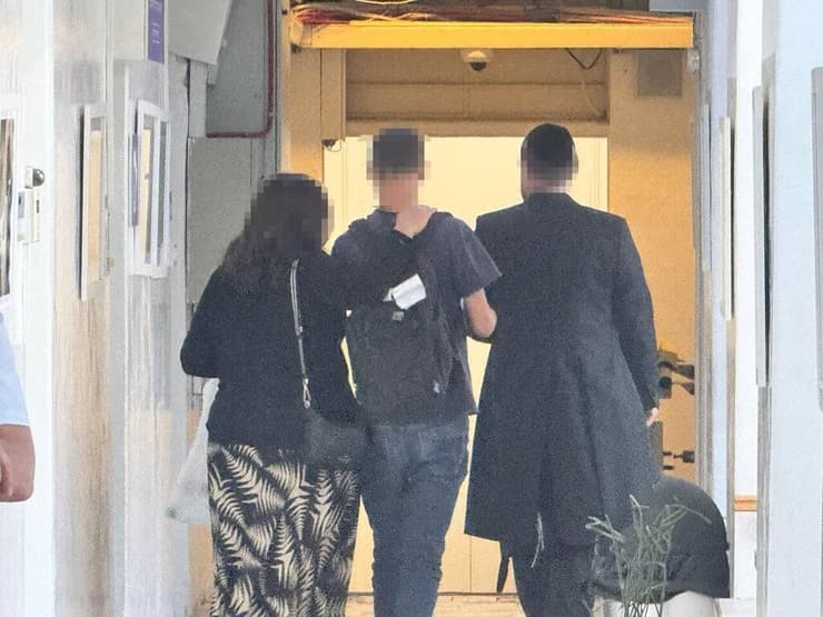 החשוד בריסוס הגרפיטי בכותל המערבי עם הוריו