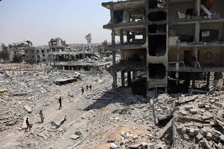 הרס בשכונת א-תופאח בעיר עזה. ההשוואה לעמלק נשמעה לא פעם (צילום: Omar Al-Qattaa / AFP) שכונת א-תופאח בעיר עזה