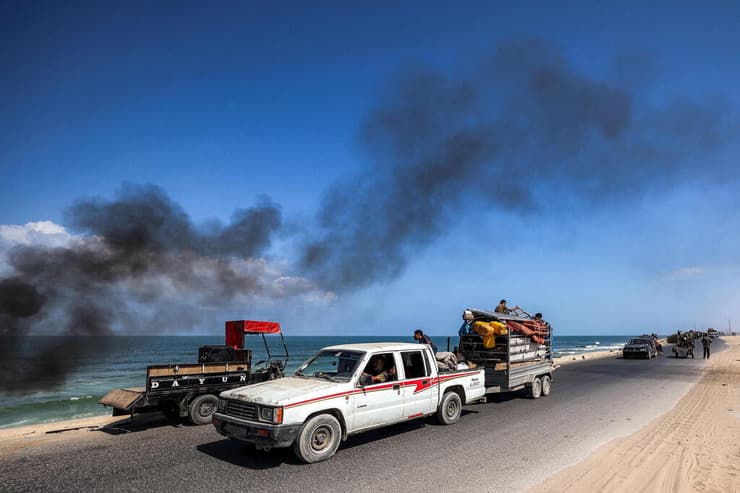 עזה פלסטינים פליטים עוזבים מצפון הרצועה דרומה