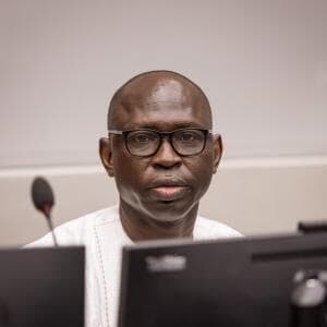 מקסים מוקום כתב אישום פושע מלחמה אפריקני בית הדין ב האג קארים חאן קרים חאן