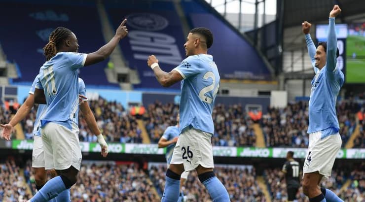 שחקני מנצ'סטר סיטי חוגגים (IMAGO) שחקני מנצ'סטר סיטי חוגגים